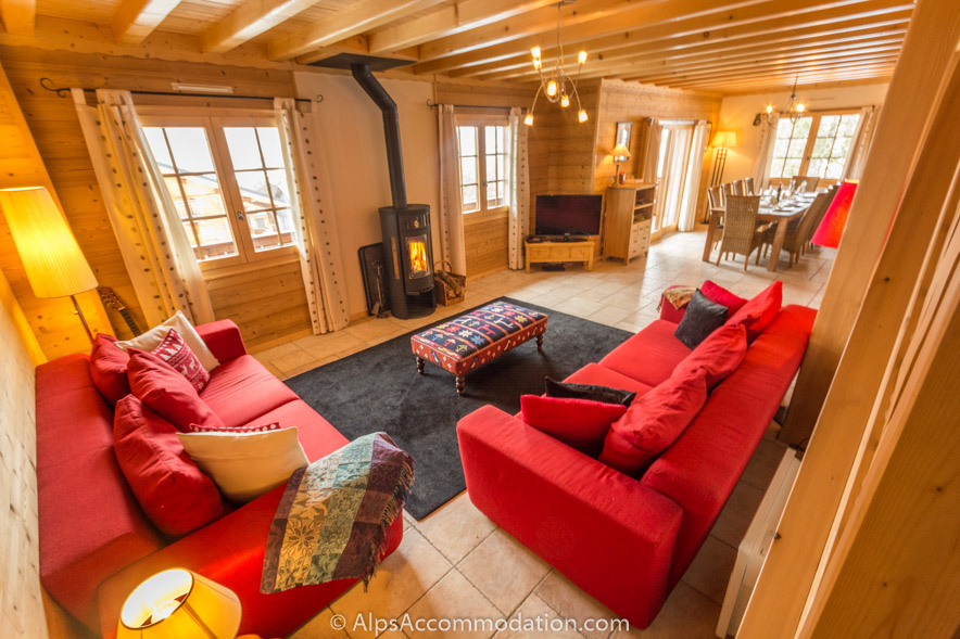 Chalet Kassy Morillon - Large lounge with deep comfortable sofas and wood burner