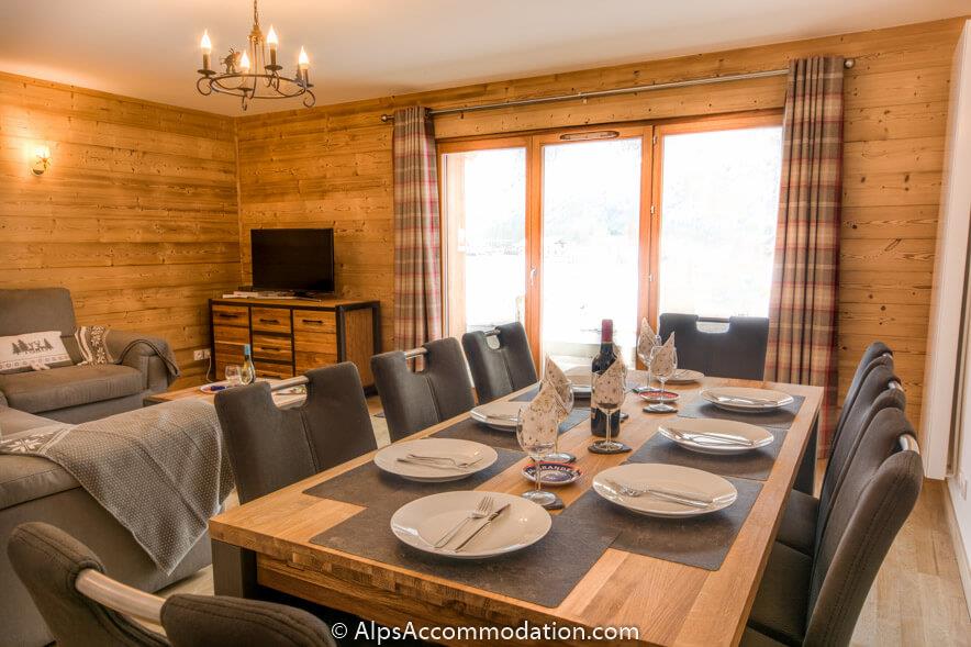 No.1 Chalet L'Orlaya Samoëns - An attractive wooden dining table with a beautiful view