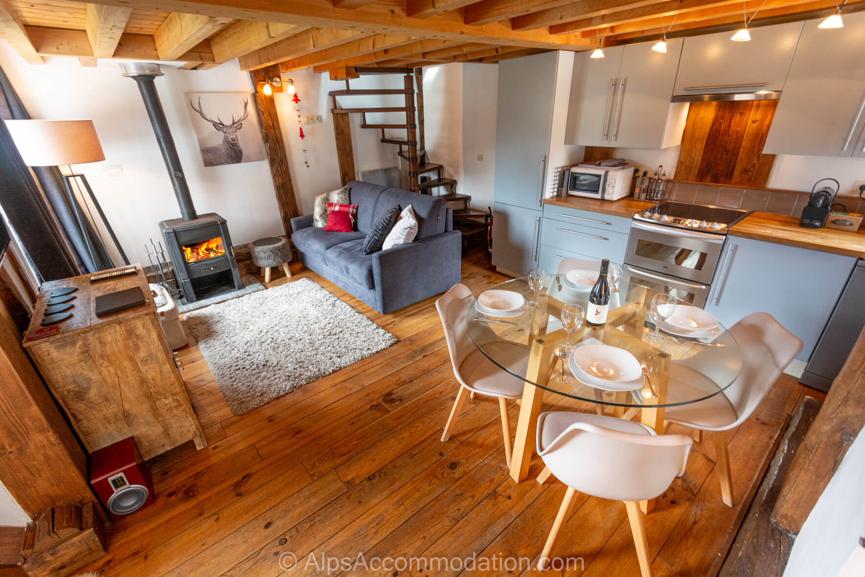 The Mazot Samoëns - Beautiful open plan living kitchen and dining areas with log burner