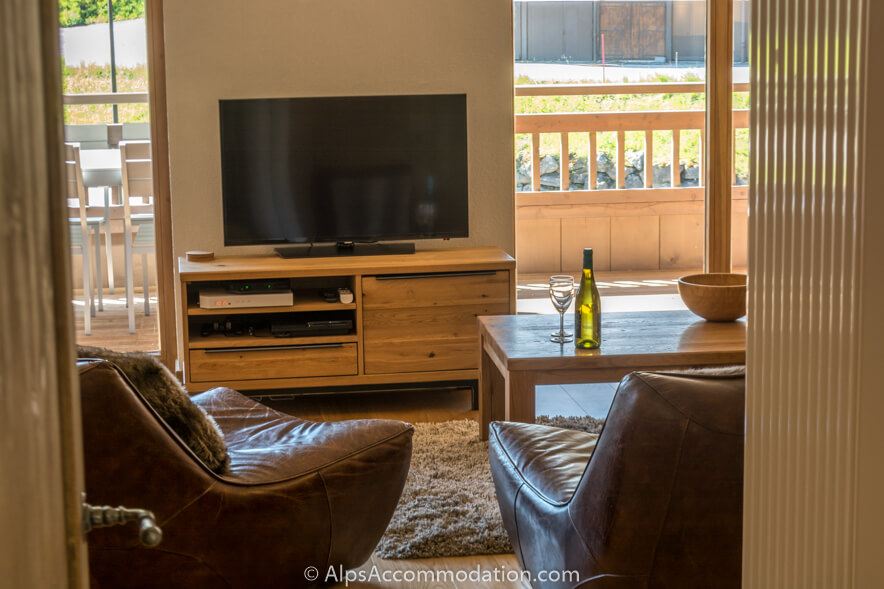 Apartment Les Niveoles A12 Morillon - The living area is equipped with large LCD TV, Playstation 3 and WiFi
