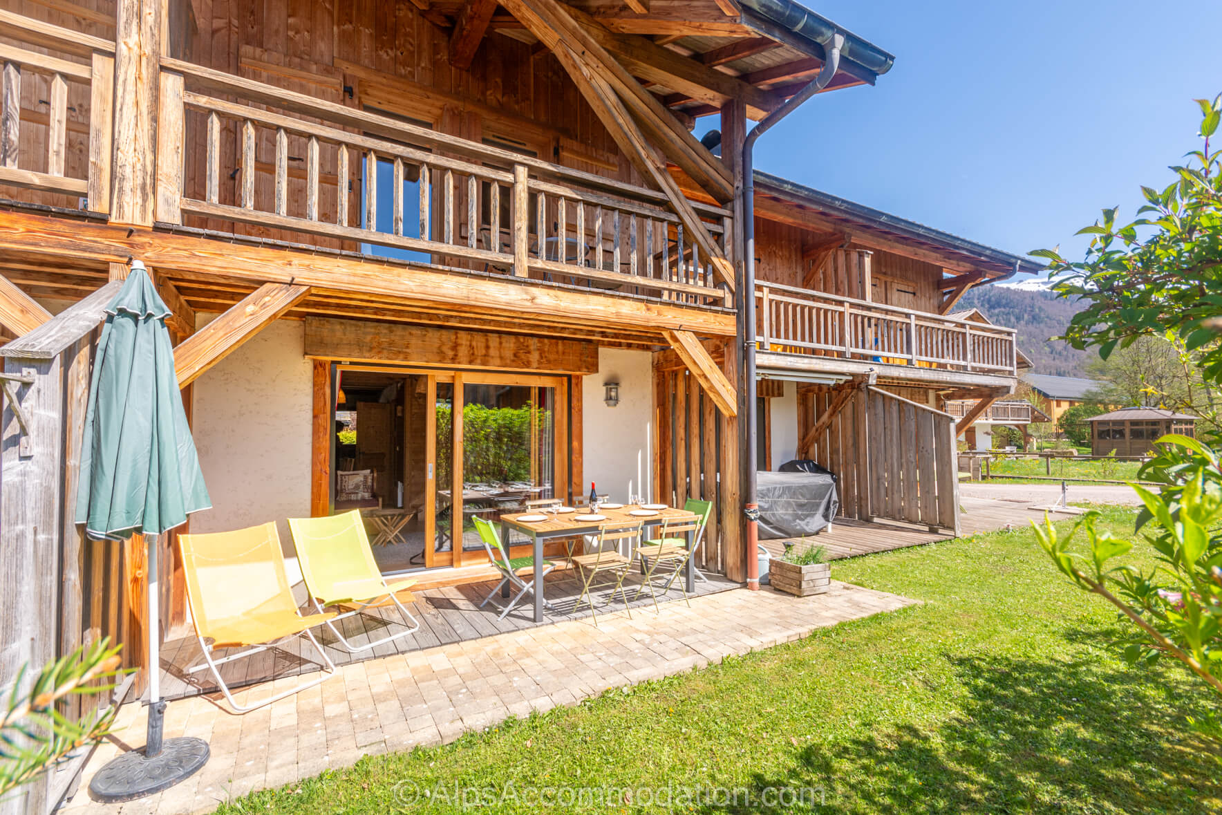 Chalet Lys Martagon Samoëns - South facing terrace and garden with table and chairs, and BBQ provided