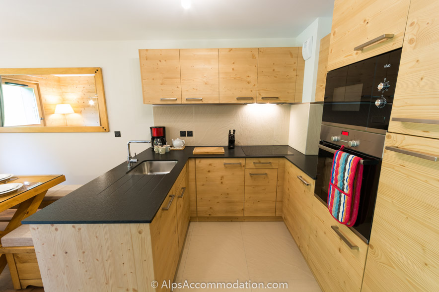 Apartment CH8 Morillon - Fully equipped kitchen with washing machine and separate dryer