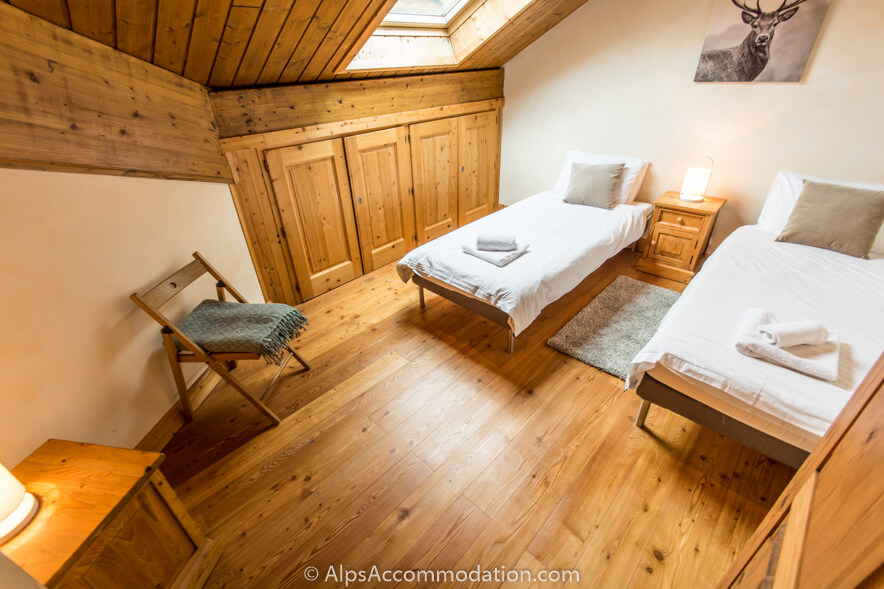 Pas Au Loup A10 Samoens - The loft style master bedroom made as a twin bedroom with further pull out bed to make a triple