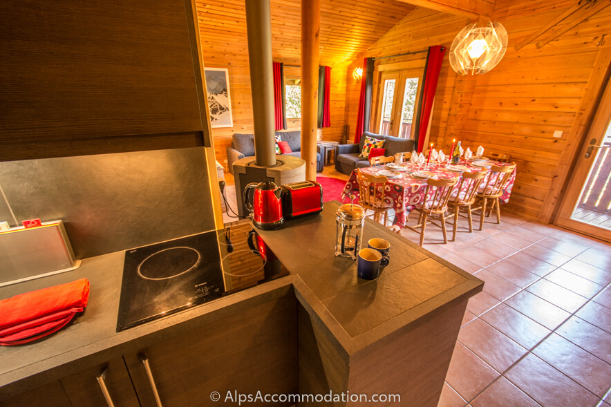 Chalet Booboo Morillon - The open plan living dining and kitchen areas with glass doors leading out onto the balcony