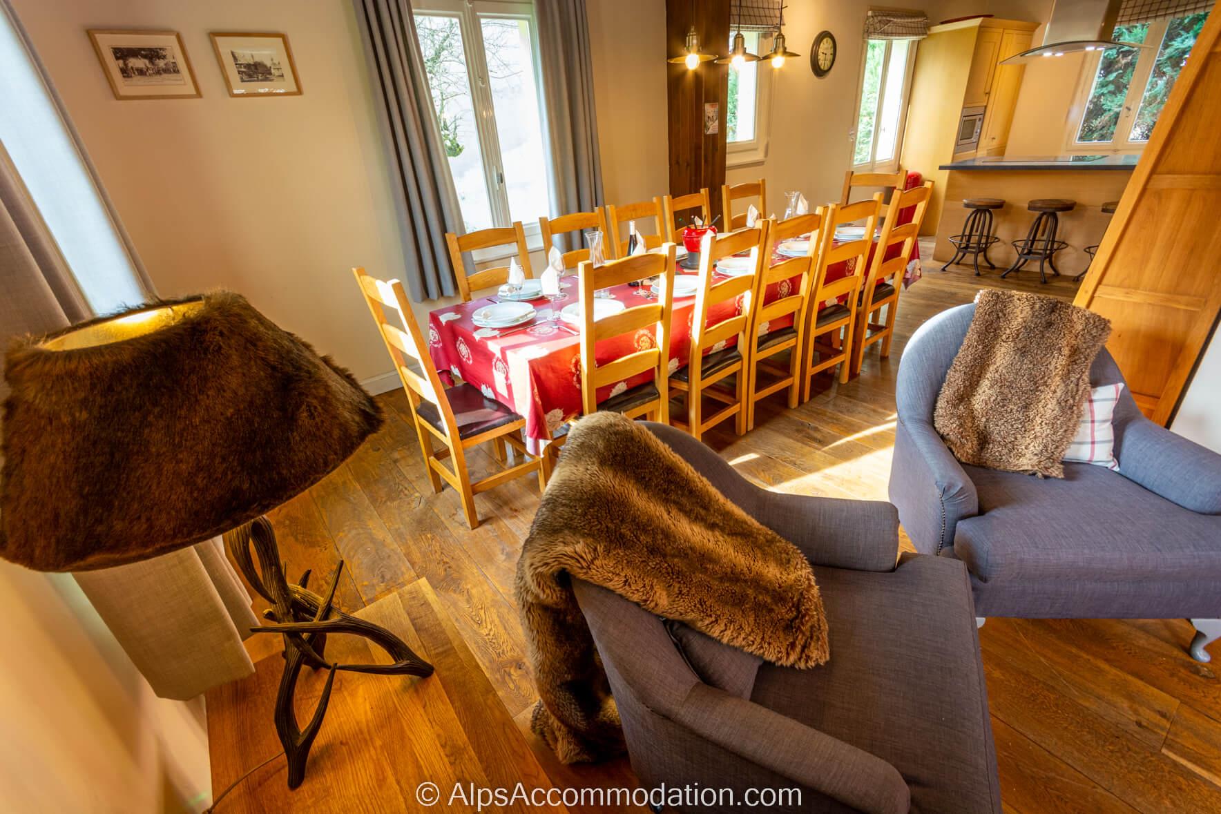Chalet Chamoissière Samoëns - Comfortable armchairs with soft fluffy throws rest in front of the log burner